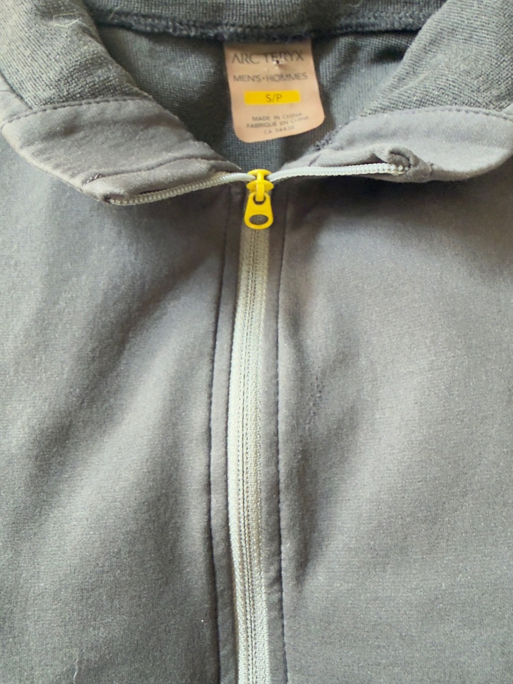 Arc'teryx Men’s Gray Jacket with Yellow Zipper